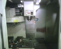 CNC Vertical Machining Center SHE HONG OMIKRON 850 SPH 2002-Photo 2