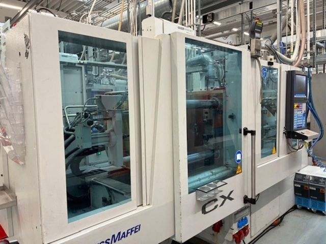 Plastics Injection Molding Machine KRAUSS MAFFEI KM 65-180 CX 2006