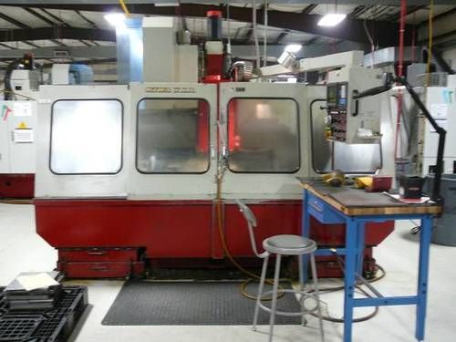 Centro di lavoro verticale CNC KIWA 1310 MUSTANG 1993